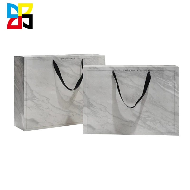 Wholesale Premium Custom Made logo printing white shopping paper bag Gift Paper Bag With Ribbon Handle