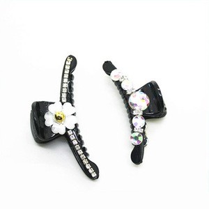 Wholesale women black hair claws with plastic flower