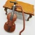Import 1PCS Music Instrument DIY 1/12 Dolls House Wooden Violin Plastic Mini Violin Dollhouse Crafts from China