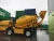 Import China XCMG SLM4 4 cubic automatic concrete mixer small concrete mixer truck price from China