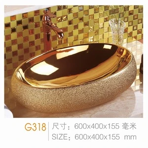 G325 Chaozhou factory direct supply ceramic gold color faucet oval shape wash hand art basin