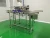 Import High-precision PLC control liquid filling machine line/perfume filling production line from China