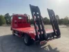 High Quality 10 Ton Flatbed Excavator Transporter Truck SINOTRUK HOWO LHD Automatic Factory Direct Telescopic Ladder