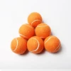 Orange tennis ball for training or promotion