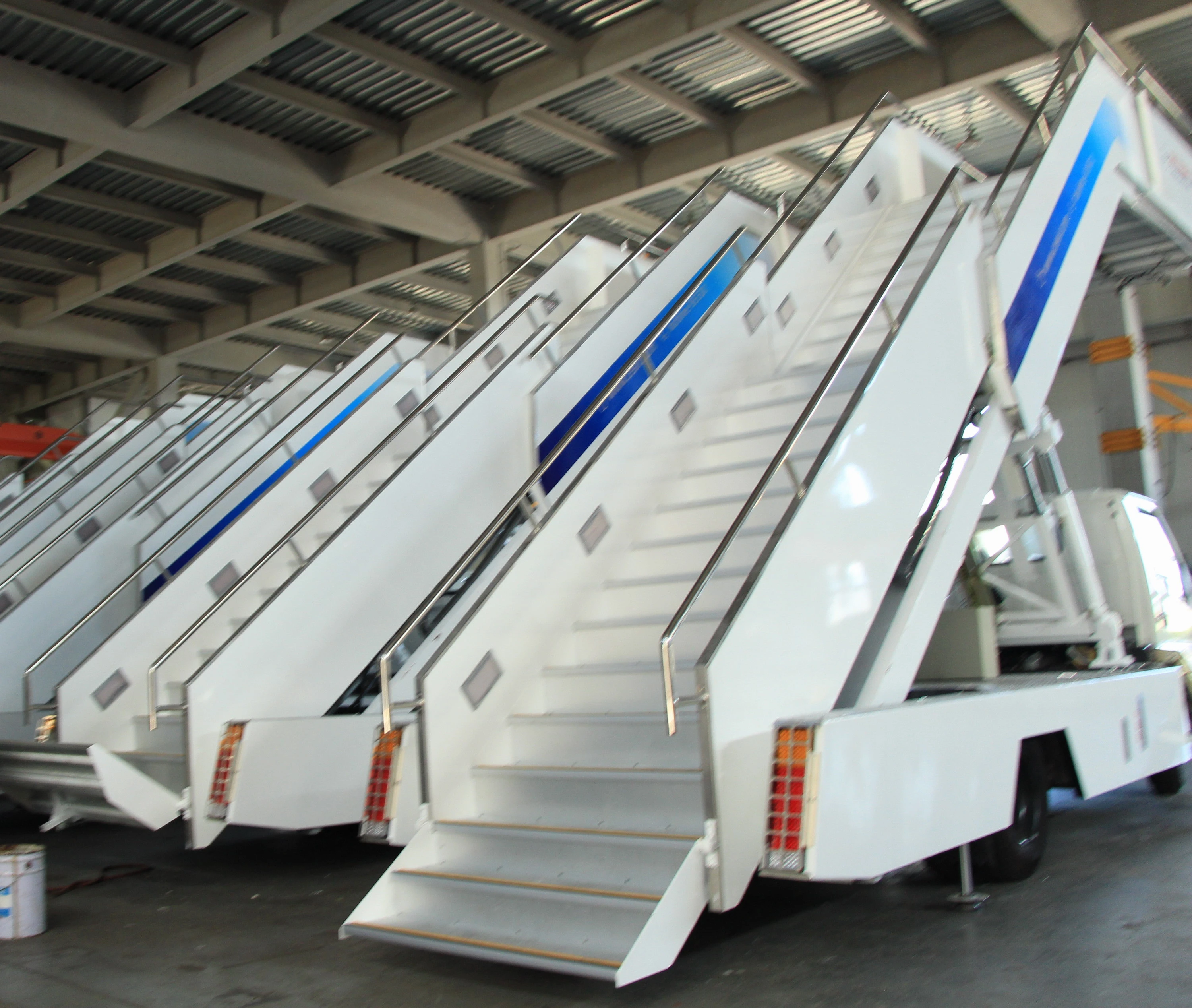 self-propelled airport passenger aircraft boarding stairs with canopy