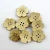 Import white color coconut flower buttons from China