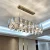 Import 2021 New Arrival Modern Style LED Glass Rod Hanging Light Lobby Dining Room K9 Gold Chandelier Crystal from China