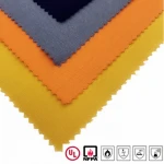 Aramid fabric with flame retardant property