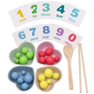 Children Practice Using Chopsticks To Hold Beads Mathematical Enlightenment Toys Wood Material
