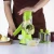 Import Green multi manual kitchen round vegetable cutter slicer cheese grater clever spiral cutter for home use from China