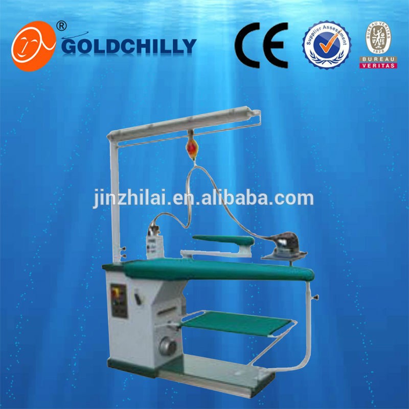Laundry Shop clothes ironing table and steam iron and steam boiler