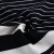 Import New style white and black poly viscose spandex yarn dyed feeder stripe knitted fabric rib from China