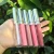 Import OEM Wholesale Luxury Matte Lipstick Pink Water Proof Lip Gloss Pigment Plumper Lip Gloss Set from China