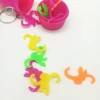 promotional new design fashionable plastic toy cute kids pink monkey barrel of mini animals keychain