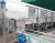 Import QGF full automatic 5 gallon mineral water filling machine/water filling production line from China