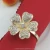 Import Rhinestone metallic flower serviette buckle holder napkin ring for Wedding party decoration from China