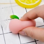 Wholesale Mochi Peach Toys Mini Pink Peach Fruits Squeeze Funny Mochi Toy Soft Stress and Anxiety Relief Toy