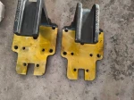Leaf spring base for wide-body mine transport vehicles