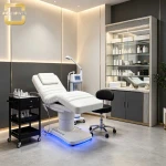 White Electric Facial Bed With Base LED Light Multi‑Motor Adjustable PU Leather Cosmetic Treatment Bed For Beauty Salon