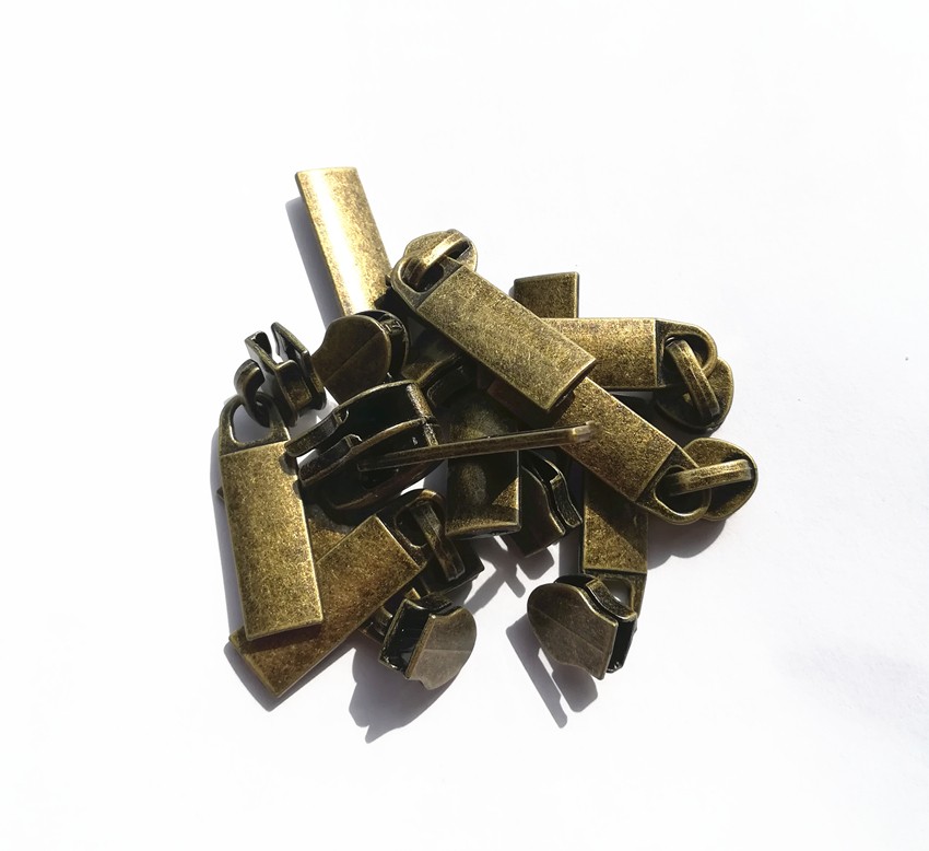 #5 new design gold teeth coil zipper custom metal zipper puller