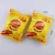 Import Chinese wholesale hot selling lower price fried chips crisps snack puffed food instant food 22g from China