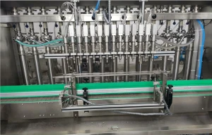 Filler capper and sticker labeling machines for essential oil