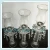 Import Flower shape and long stemmed glass candle holder with bead ball drop from China