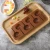 Import High Quality 3D Round Angels Smiling Faces Flowers Stars and Heart Shape Silicone Chocolate Hard Candy Lollipop Molds Tray for C from China