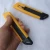 Import Left handed safety auto back cutter portable utility knife from China