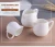 Import mini ceramic milk jug white porcelain milk pot sugar creamer pot from China