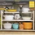 Import New 2 tier under sink expandable shelf organizer rack storage kitchen tool holders from China