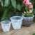 Import The best flower pots planters clear plastic pots simple bulk flower pots for orchid flowers from China