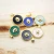 Import Wholesale new fashion round coin shape slice stone 18k real gold plated charms malachite flat stone lapis pendant jewelry from China