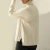 Import women winter warm ribbed turtleneck high low hem sweater from China