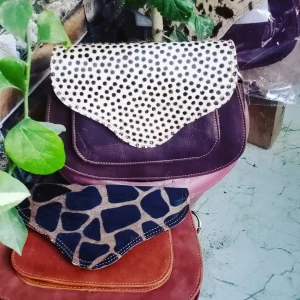 Black spotted animal style multicolor sling bag for women