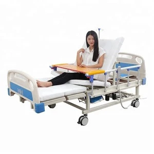Bariatric turn-over hospital bed with remote control