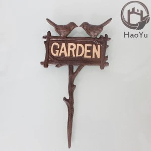 cast iron bird shaped garden ornament for flower receptacle
