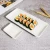 Import Custom 9 inch white rectangle porcelain sushi plate food serving tray ceramic serving plate from China