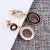 Import Custom stainless steel round shaped ladies earrings designs pictures simple fancy gold stud earrings women from China