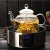 Import Gift Tea Set 600ml Glass Tea Set with Candle Warmer &amp; 6 Double Wall Tea Cups from China
