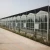 Import Large size commercial glass  greenhouse with hydroponics system from China