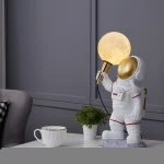 Postmodern simple astronaut table lamps bedroom light fixtures warm soft nightstand lamps