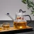 Import Pyrex Heat Resistant Borosilicate Glass Teapot Unique Shape Style Glass Teapot With Glass Infuser from China