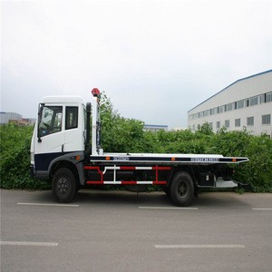 Shanghai heavy duty new condition flat bed road wrecker tow truck with Crane for sale