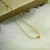 Import shell stainless steel 18k gold plated loose yoni real fresh water pearl necklace jewelry polynesian stud small beads jewelry from China