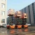 Import Small Crawler Mini Crane aerial towable boom lift trailer mounted articulated boom lift jib cranes from China