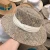 Import Travel Natural seagrass hollow flat brim hat ladies summer porkpie concave round sun straw hat with ribbon from China