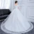 Import wholesale luxury long tail white lace plus size wedding dress bridal gown from China