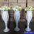 Import Wholesale restaurant table plastic flower vase in white color from China