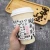 Import Disposable paper cup holder Coffee cup holder Paper Coffee custom cup sleeve from China